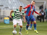 Jefferson Nascimento of Sporting Club de Portugal competes with Jordon Mutch of Crystal Palace during the 2015 Cape Town Cup Final match between Crystal Palace FC and Sporting Lisbon at Cape Town Stadium on July 26, 2015