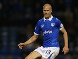 Johnny Ertl of Portsmouth in action during the Johnstone's Paint Trophy Southern Section Second Round match between Portsmouth and Northampton Town at Fratton Park on October 7, 2014