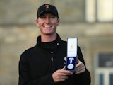 Amateur Jordan Niebrugge of the United States holds the Silver Medal awarded to highest placed amateur after the final round of the 144th Open Championship at The Old Course on July 20, 2015