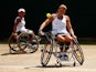 Jordanne Whiley of Great Britain in action in the Wheelchair Ladies Doubles against Lousie Hunt of Great Britain and Katharina Kruger of Germany during day eleven of the Wimbledon Lawn Tennis Championships at the All England Lawn Tennis and Croquet Club o