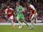 Wolfsburg's Belgian midfielder Kevin De Bruyne (2nd L) vies with Arsenal's Spanish midfielder Santi Cazorla and Arsenal's English defender Calum Chambers (R) during the pre-season friendly football match between Arsenal and Wolfsburg at The Emirates Stadi