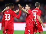 James Milner (R) of Liverpool celebrates with Jordon Ibe (L) after scoring the first goal during the international friendly match between Adelaide United and Liverpool FC at Adelaide Oval on July 20, 2015