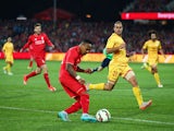 Nathaniel Clyne of Liverpool controls the ball during the international friendly match between Adelaide United and Liverpool FC at Adelaide Oval on July 20, 2015