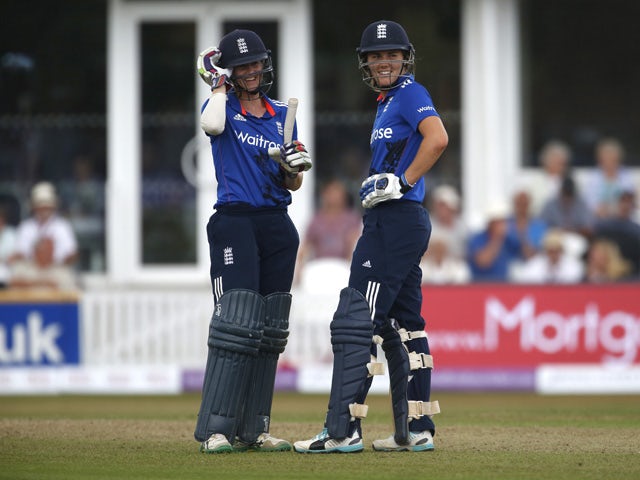 Lydia Greenway (L) and Natalie Sciver of England chat between overs during the 1st Royal London ODI of the Women's Ashes Series between England Women v Australia Women at The County Ground on July 21, 2015