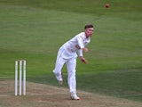 Mason Crane of Hampshire bowls on his county championship debut during the LV County Championship match between Hampshire and Durham at Ageas Bowl on July 19, 2015