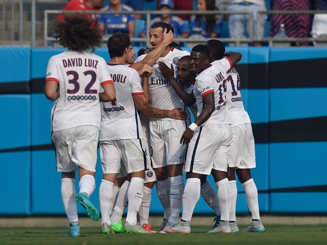 Teammates celebrate with Zlatan Ibrahimovic #10 of Paris Saint-Germain after his first half goal against Chelsea during their International Champions Cup match at Bank of America Stadium on July 25, 2015