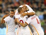 Adem Ljajic of AS Roma is congratulated by team mates after scoring a goal during the International Champions Cup friendly match between Manchester City and AS Roma at the Melbourne Cricket Ground on July 21, 2015