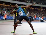 Usain Bolt of Jamaica celebrates winning the Mens 100m final during day one of the Sainsbury's Anniversary Games at The Stadium - Queen Elizabeth Olympic Park on July 24, 2015