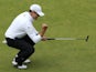 Zach Johnson of the United States celebrates a birdie putt on the 18th green during the final round of the 144th Open Championship at The Old Course on July 20, 2015
