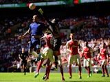 John Terry of Chelsea and Petr Cech of Arsenal compete for the ball during the FA Community Shield match between Chelsea and Arsenal at Wembley Stadium on August 2, 2015