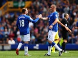 Wayne Rooney of Everton and Manchester United with Duncan Ferguson of Everton at the end of the Duncan Ferguson Testimonial match between Everton and Villarreal at Goodison Park on August 2, 2015