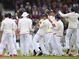 England players celebrate after David Warner is dismissed on day one of the Third Test of The Ashes on July 29, 2015