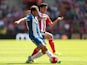 Victor Sanchez of Espanyol holds off pressure from Juanmi of Southampton during the pre season friendly match between Southampton and Espanyol at St Mary's Stadium on August 2, 2015