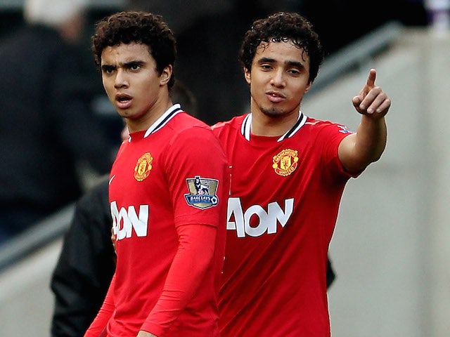 Fabio Da Silva (L) and Rafael Da Silva during the Barclays Premier League Match between Wolverhampton Wanderers and Manchester United at Molineux on March 18, 2012