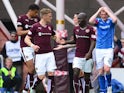 Sam Nicholson, of Hearts celebrates with team mate Morgaro Gomis after scoring during the Ladbrokes Scottish Premiership match between Heart of Midlothian FC and St Johnstone FC at Tynecastle Stadium on August 2, 2015