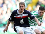  McAlister of Dundee competes with Gary Hooper of Celtic during the Clydesdale Bank Scottish Premier League match between Celtic and Dundee on September 22, 2012