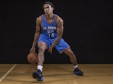 Josh Huestis #14 of the Oklahoma City Thunder poses for a portrait during the 2014 NBA rookie photo shoot at MSG Training Center on August 3, 2014