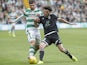 Nadir Ciftci of Celtic and Bedavi Huseynov of FK Qarabag in action during the UEFA Champions League Third Qualifying Round 1st Leg match between Celtic and FK Qarabag at Celtic Park on July 29, 2015