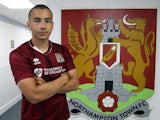 Northampton Town new signing Rod McDonald poses during a photo call at Sixfields Stadium on July 28, 2015