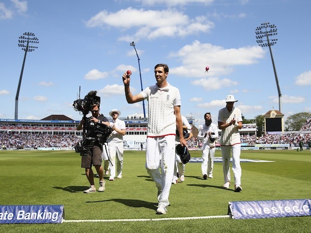 Steven Finn leads the England team off on day three of the third Ashes Test at Edgbaston on July 31, 2015