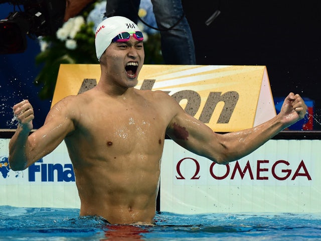 China's Sun Yang celebrates after winning the men's 400m freestyle final swimming event at the 2015 FINA World Championships in Kazan on August 2, 2015