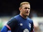 Manchester United's former Everton forward Wayne Rooney warms up ahead of the Duncan Ferguson Testimonal pre-season friendly football match between Everton and Villarreal at Goodison Park in Liverpool, north west England on August 2, 2015