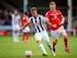 Callum McManaman of West Brom holds off Reece Flanagan of Walsall during the Pre-Season Friendly between Walsall and West Bromwich Albion at Banks' Stadium on July 28, 2015