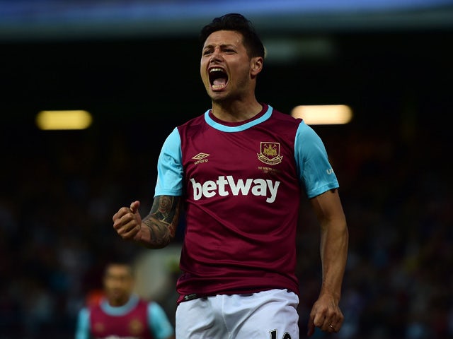 Mauro Zarate of West Ham celebrates scoring his side's second goal during the UEFA Europa League third qualifying round match between West Ham United and Astra Giurgiu at the Boleyn Ground on July 30, 2015 