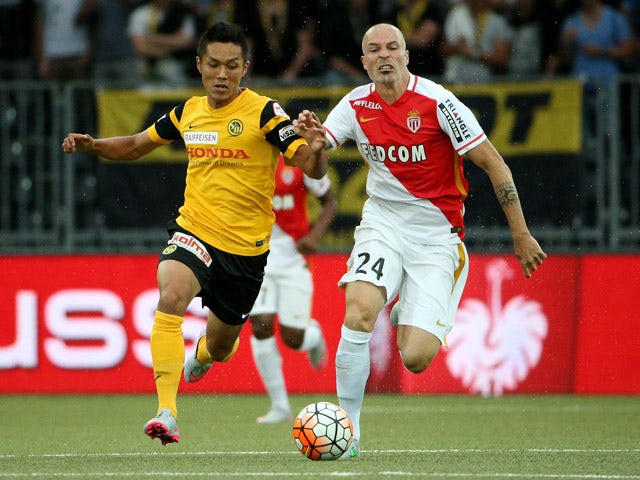Yuya Kubo of BSC Young Boys (L) competes for the ball with Andrea Raggi of AS Monaco during the UEFA Champions League third qualifying round 1st leg match between BSC Young Boys and AS Monaco at Stade de Suisse on July 28, 2015