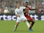 Bayern Munich's Austrian defender David Alaba and Real Madrid's Lucas Vazquez vie for the ball during the Audi Cup final football match Real Madrid vs FC Bayern Munich in Munich, southern Germany, on August 5, 2015