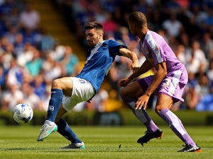 Jon Toral of Birmingham looks to pass under pressure from Michael Hector of Reading during the Sky Bet Championship match between Birmingham City and Reading at St Andrews Stadium on August 8, 2015 