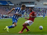 Solly March of Brighton tries to get past Danny Fox of Nottingham Forest during the Sky Bet Championship match between Brighton & Hove Albion and Nottingham Forest at Amex Stadium on August 7, 2015