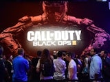 Gaming fans wait in line to play Call of Duty Black Ops III at E3 - the Electronic Entertainment Expo - an annual video game conference and show at the Los Angeles Convention Center on June 16, 2015