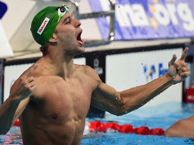 South Africa's Chad Le Clos celebrates winning the final of the men's 100m butterfly swimming event at the 2015 FINA World Championships in Kazan on August 8, 2015