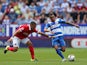 Tiaronn Chery of Queens Park Rangers breaks away from Ahmed Kashi of Charlton Athletic during the Sky Bet Championship match between Charlton Athletic and Queens Park Rangers at The Valley on August 8, 2015