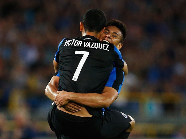 Victor Vazquez of Club Brugge celebrates scoring his teams second goal of the game with team mate Oscar Duarte during the third qualifying round 2nd Leg UEFA Champions League match between Club Brugge and Panathinaikos held at Jan Breydel Stadium on Augus