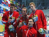 Gold medalists Daniel Wallace, Robert Renwick, Calum Jarvis and James Guy of Great Britain pose during the medal ceremony for the Men's 4x200m Freestyle Relay final on day fourteen of the 16th FINA World Championships at the Kazan Arena on August 7, 2015