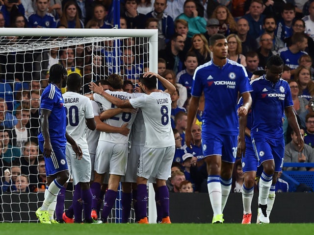 Fiorentina players celebrate the opening goal scored by Fiorentina's Argentinian defender Gonzalo during the pre-season friendly International Champions Cup football match between Chelsea and Fiorentina at Stamford Bridge in London on August 5, 2015