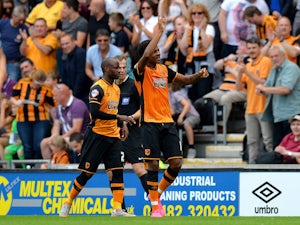 Chuba Akpom of Hull City celebrates scoring their second goal during the Sky Bet Championship match between Hull City and Huddersfield Town at KC Stadium on August 8, 2015
