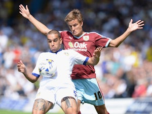 Leeds, Burnley share points after late goals