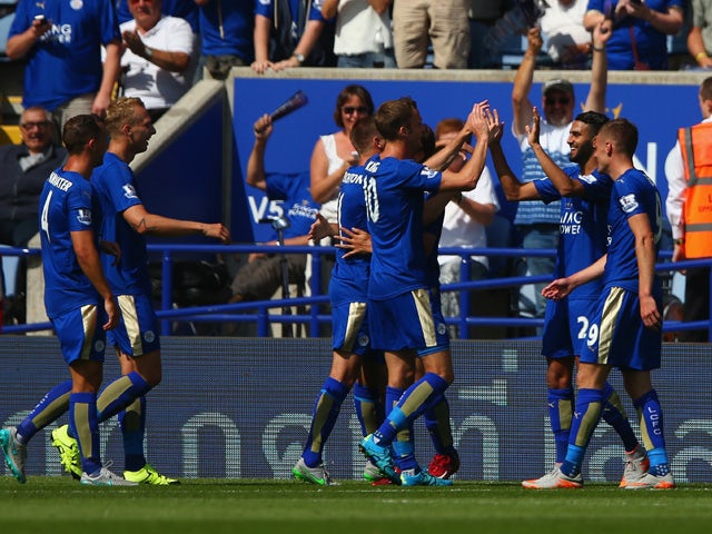 Riyad Mahrez of Leicester City celebrates scoring his team's second goal with his team mates during the Barclays Premier League match between Leicester City and Sunderland at The King Power Stadium on August 8, 2015