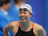 Natsumi Hoshi of Japan celebrates after winning the gold medal in the Women's 200m Butterfly Final on day thirteen of the 16th FINA World Championships at the Kazan Arena on August 6, 2015