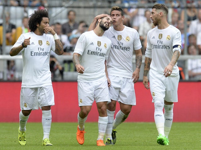 Real Madrid's Brazilian defender Marcelo, Real Madrid's midfielder Isco, Real Madrid's Columbian midfielder James and Real Madrid's defender Sergio Ramos celebrates scoring during the Audi Cup football match Real Madrid vs Tottenham Hotspur in Munich, sou