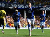 Ross Barkley of Everton celebrates scoring his team's first goal during the Barclays Premier League match between Everton and Watford at Goodison Park on August 8, 2015