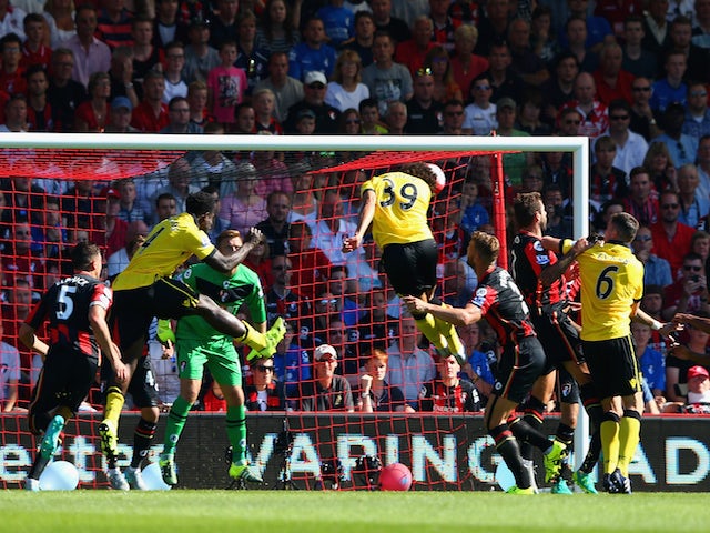 Rudy Gestede (C) of Aston Villa scores his team's first goal with his team mate Carlos Sanchez (R) during the Barclays Premier League match between A.F.C. Bournemouth and Aston Villa at Vitality Stadium on August 8, 2015