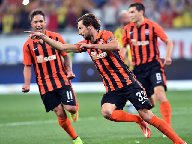 Shakhtar's Darijo Srna celebrates after scoring a goal during the UEFA Champions League third qualifying round football match between FC Shakhtar Donetsk and Fenerbahce SC in Lviv on August 5, 2015