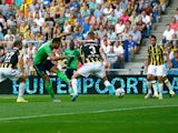Graziano Pelle of Southampton shoots and scores his teams first goal of the game with team mates during the UEFA Europa League third qualifying Round 2nd Leg match between Vitesse Arnhem and Southampton FC held at GelreDome on August 6, 2015