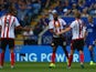 Jermain Defoe of Sunderland celebrates scoring his team's first goal with his team mate Sebastian Larsson and Jack Rodwell during the Barclays Premier League match between Leicester City and Sunderland at The King Power Stadium on August 8, 2015