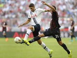 Tottenham's Argentinian defender Federico Fazio and Milan's midfielder Allesandro Matri vie the ball during the Audi Cup football match for third place Tottenham Hotspur vs AC Milan in Munich, southern Germany, on August 5, 2015