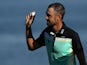 Troy Merritt acknowledges the crowd and holds up his ball after winning the Quicken Loans National at the Robert Trent Jones Golf Club on August 2, 2015
